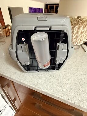 Gray Plastic Pet Carrier with Water Bottle